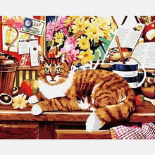 Load image into Gallery viewer, Big Cat Sitting On Table With Flowers And Other Stuff
